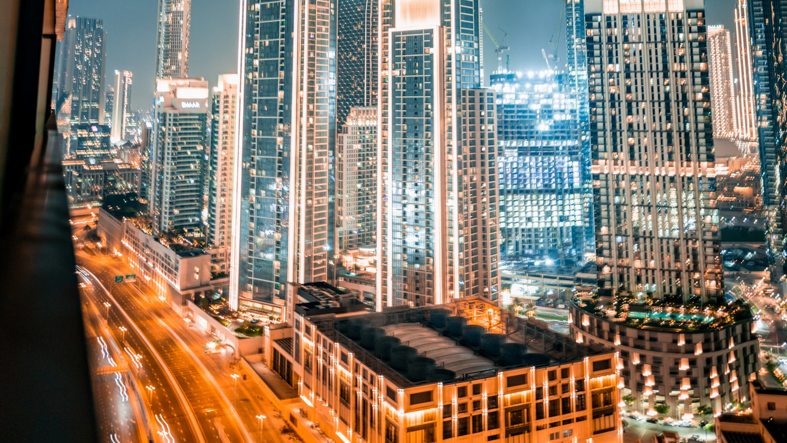 Dubai skyline at night with corporate towers — the financial backdrop of a GCC fleet leasing niche.