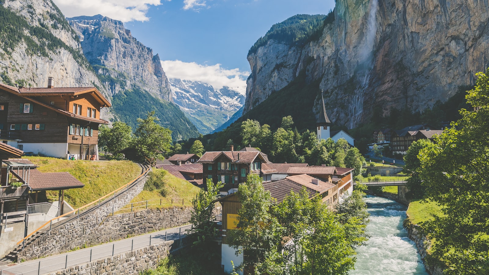 Swiss Alps with a mountain village — Switzerland-regulated Maclear versus Latvia's Mintos.